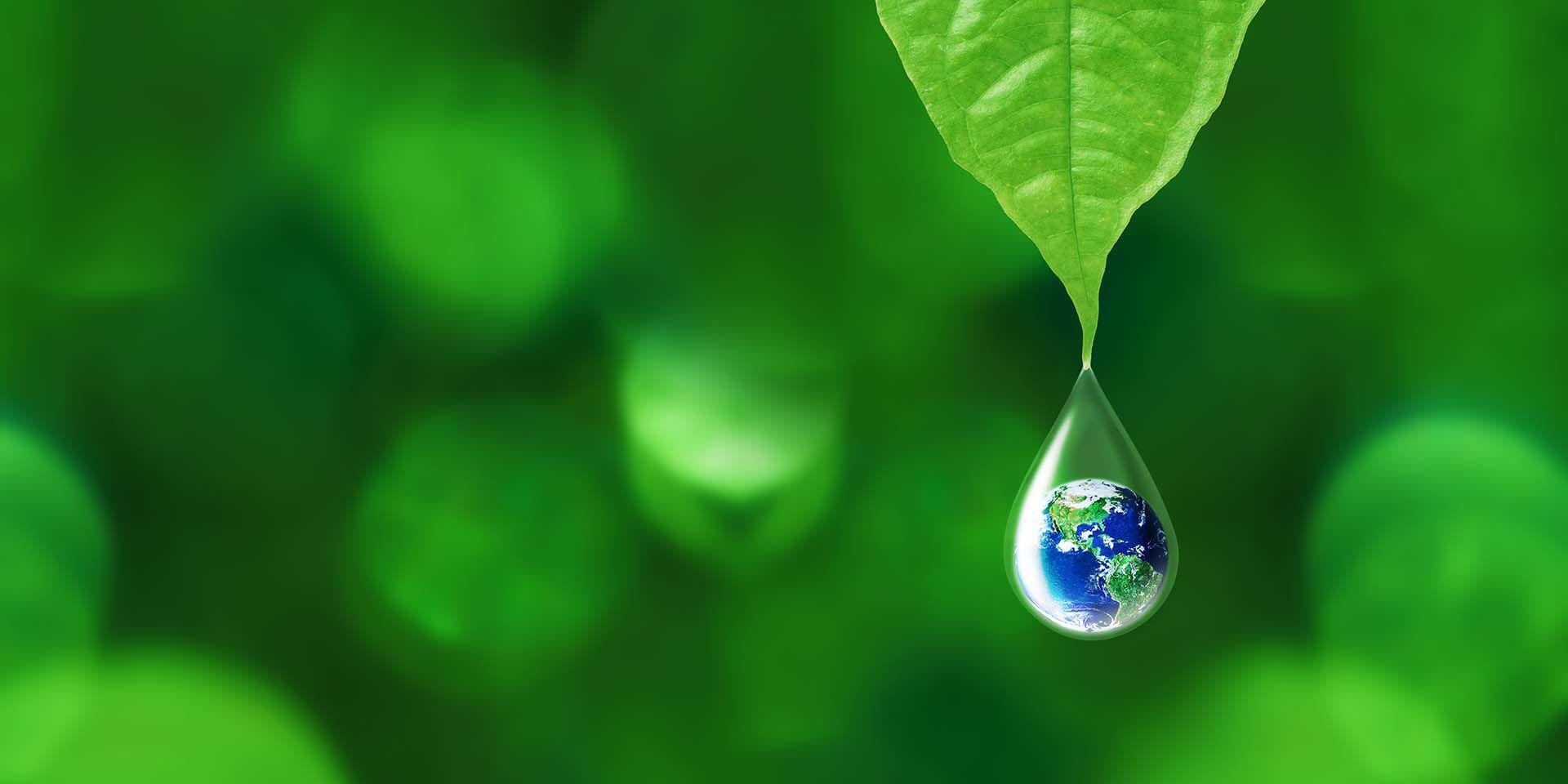Illustration showing blue planet in a dew drop.