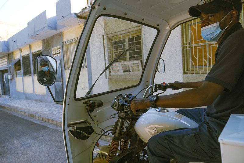 A Paps driver delivers supplies in Dakar.